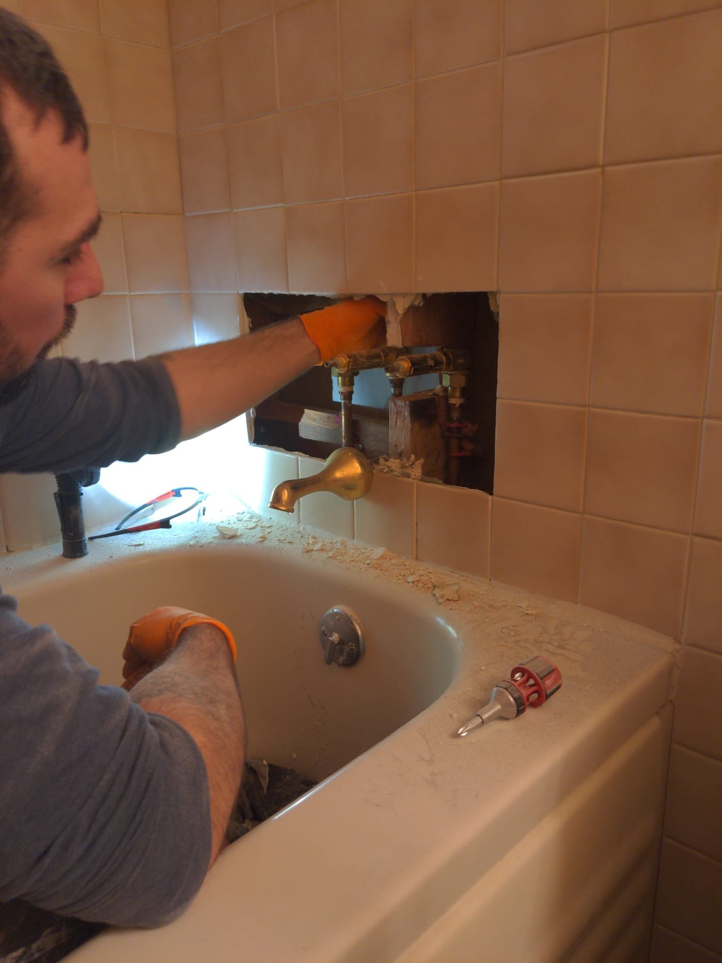LaVergne's plumber investigating signs of a hidden water leak in a Skagit County home