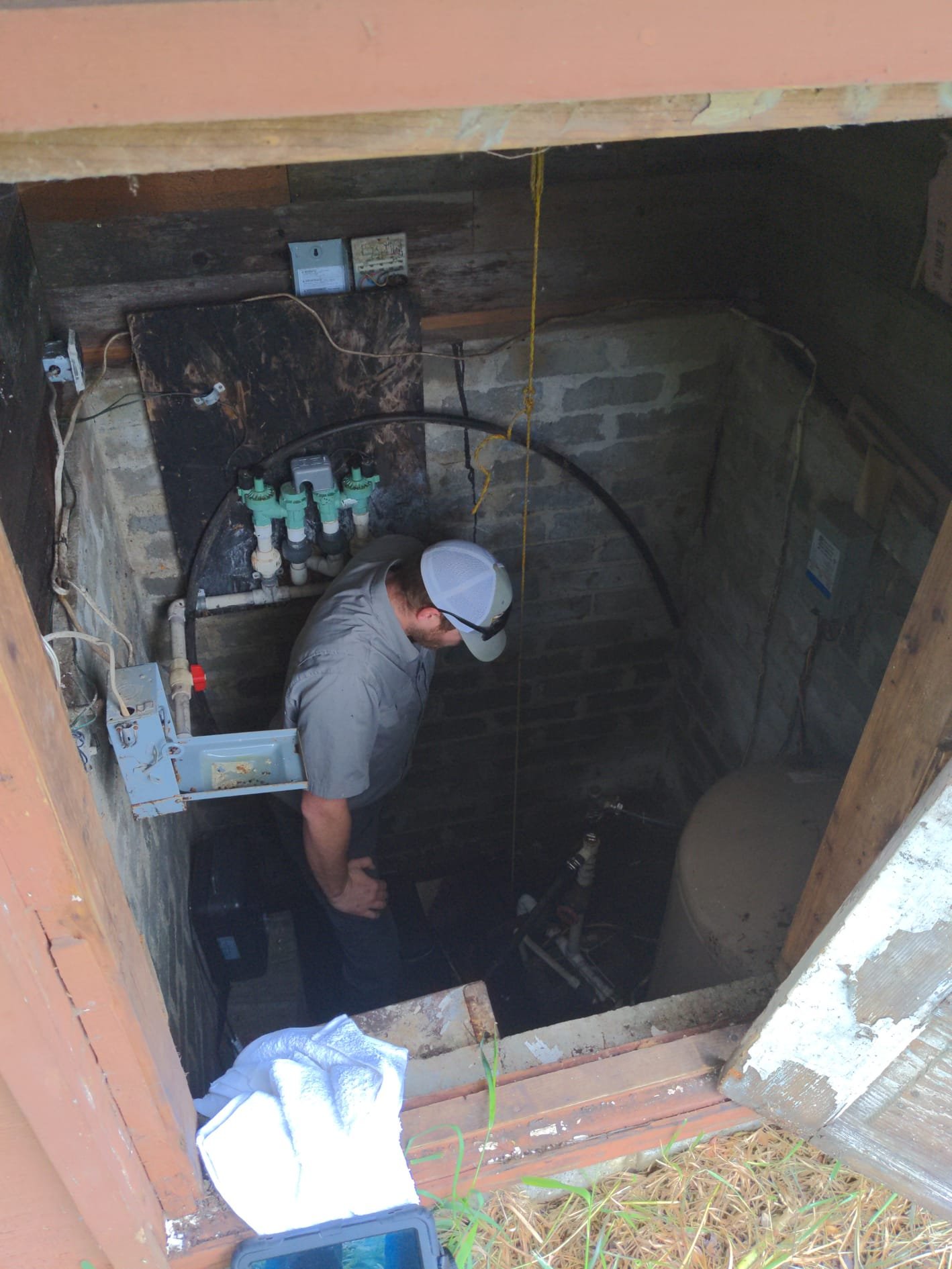 LaVergne's septic pumping truck servicing a residential tank at a rural property