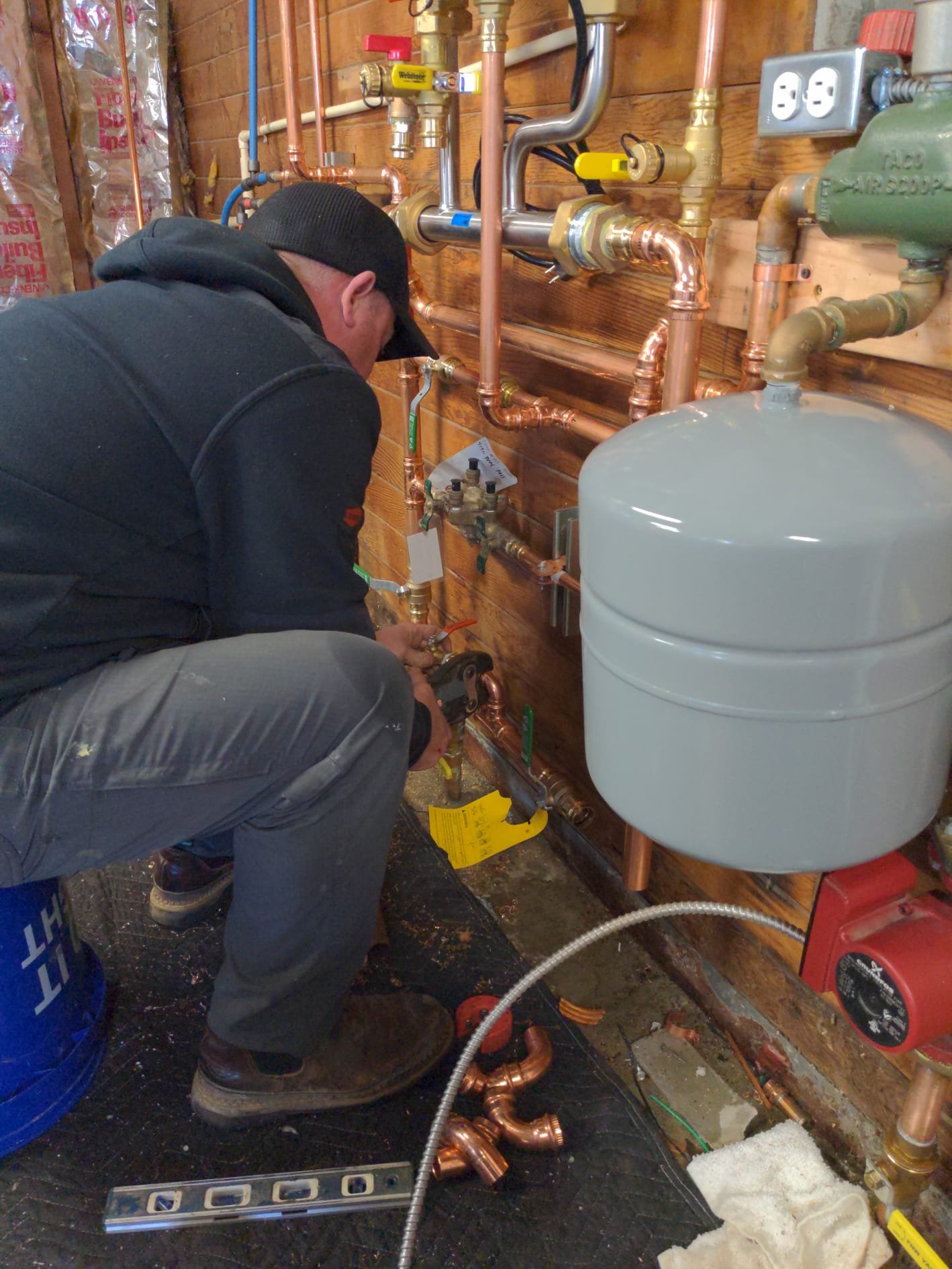 Rebuilt tank tee with new pressure switch and gauge on a LaVergne's pressure tank installation