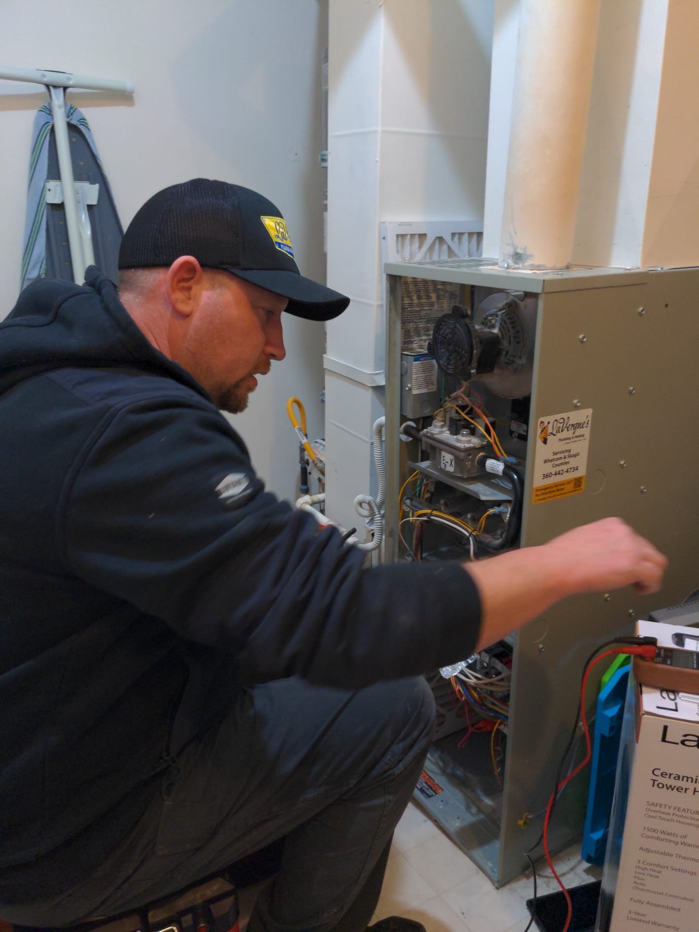 LaVergne's technician commissioning a new heat pump and recording performance data