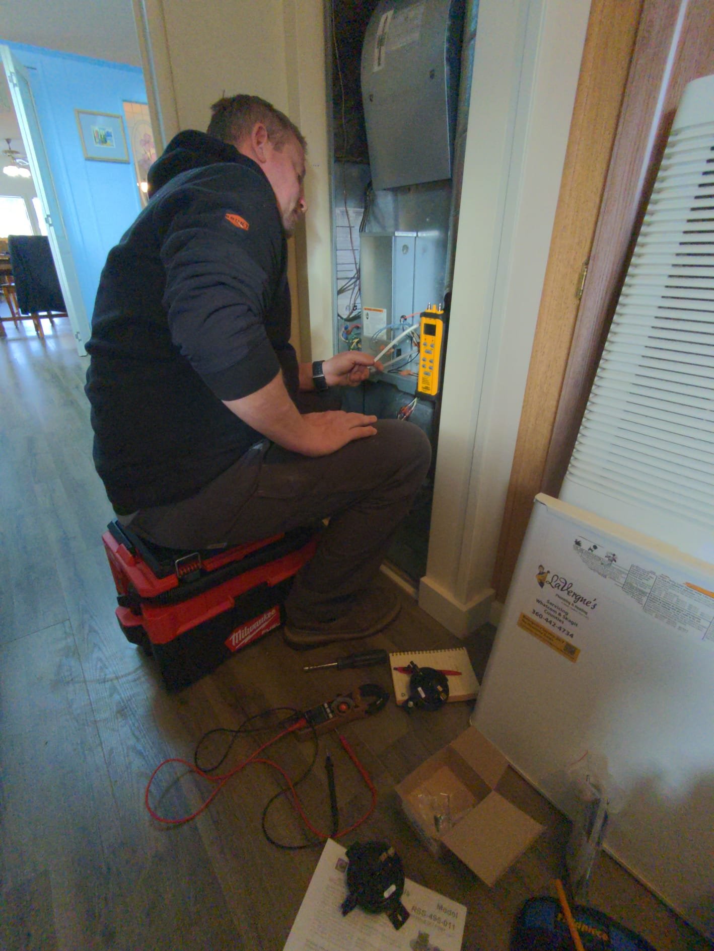 Gas system load calculation being reviewed before sizing a new appliance line