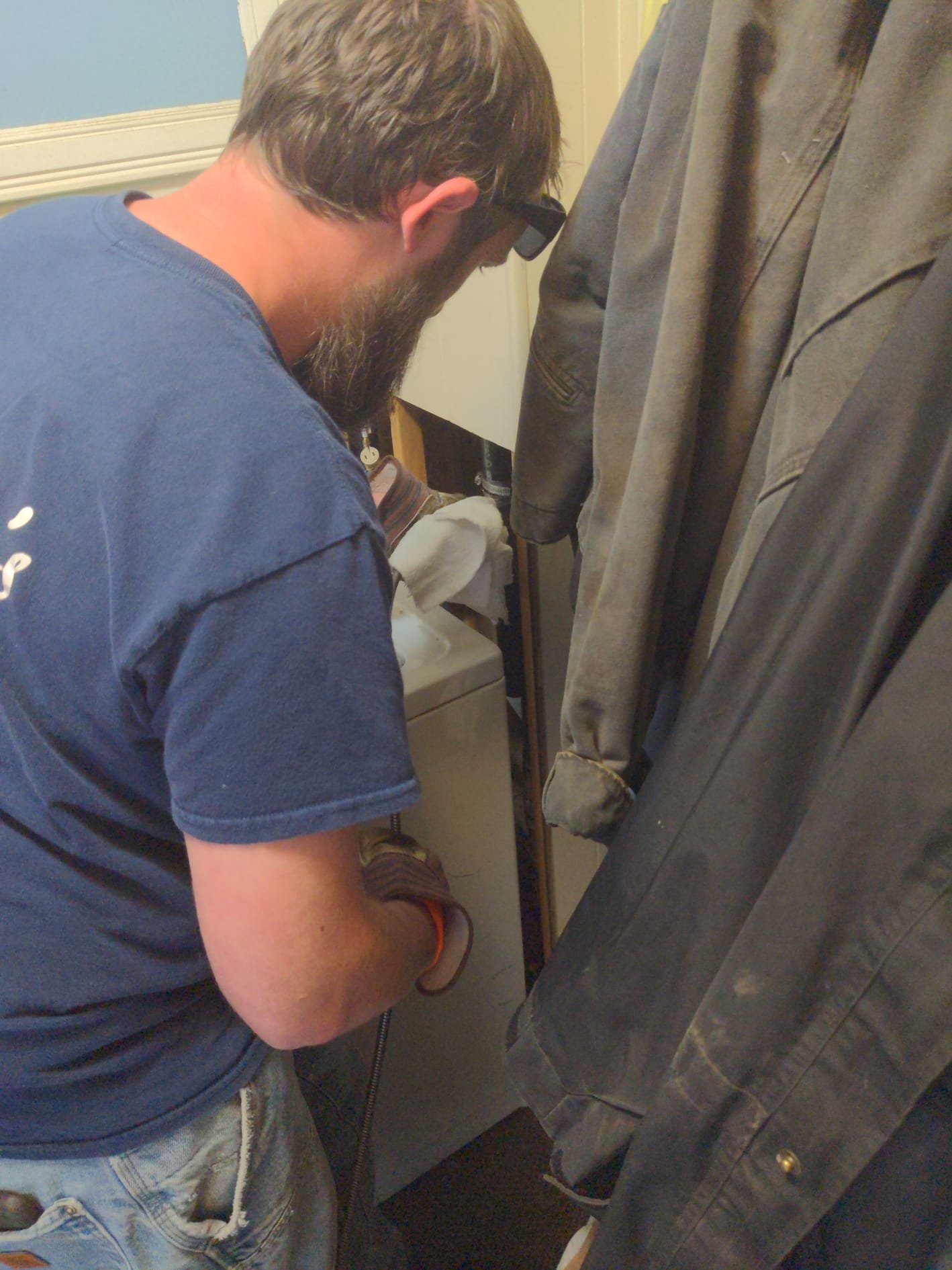 LaVergne's gas fitter routing new gas piping through a framed wall to an appliance location