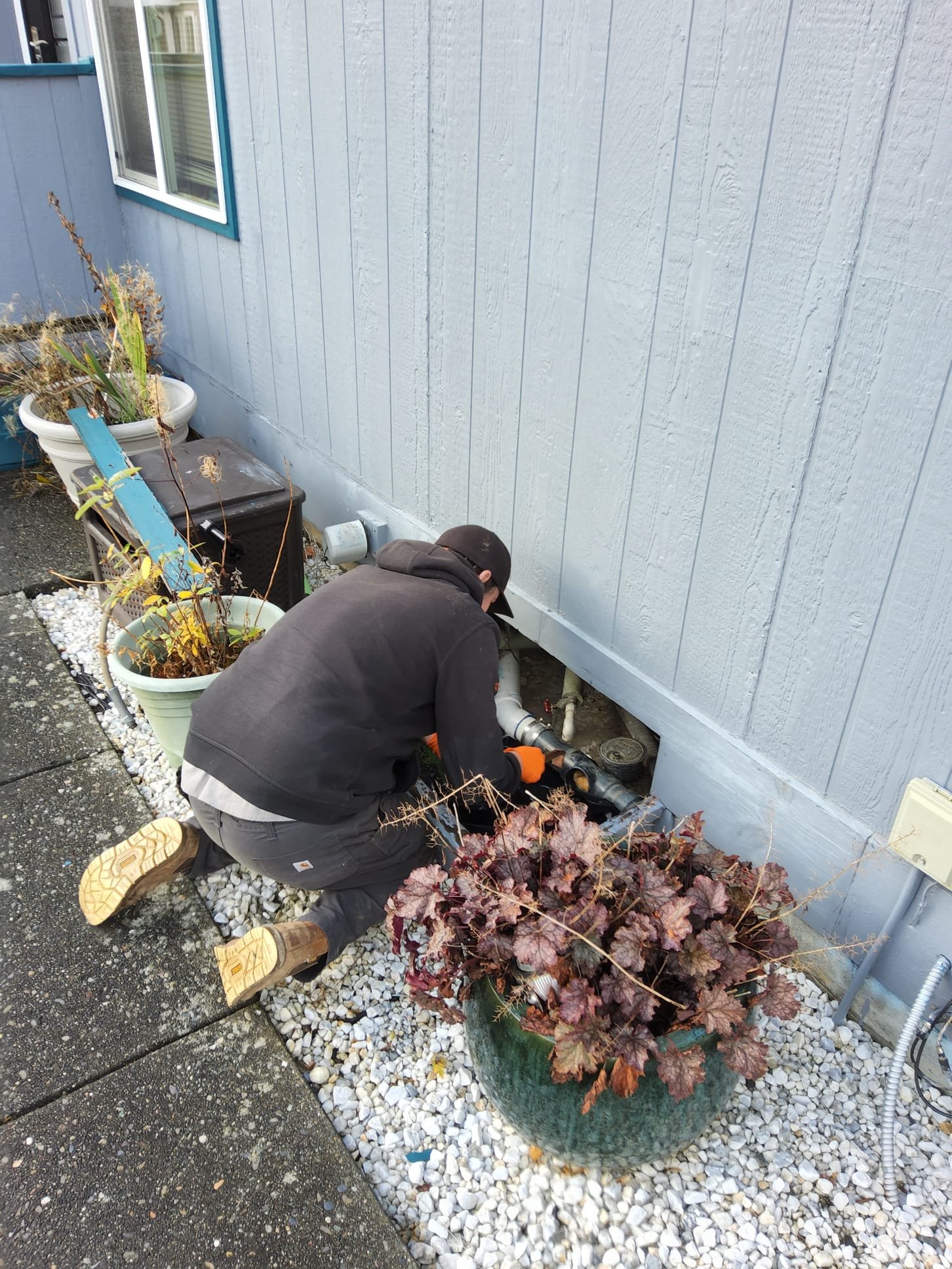 Sewer inspection camera being fed into a residential cleanout by a LaVergne's plumber