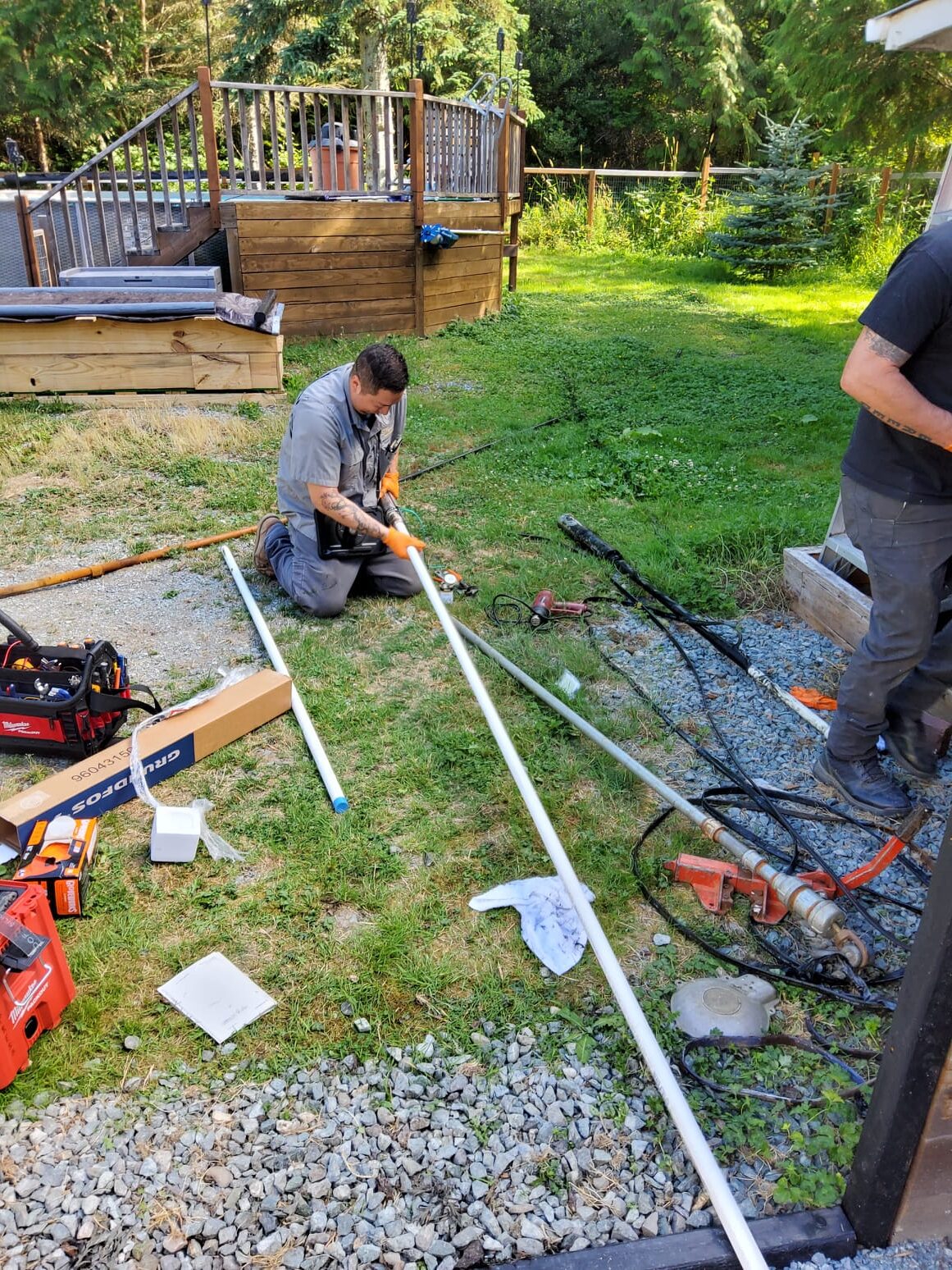 LaVergne's crew pulling a submersible well pump for replacement at a rural property